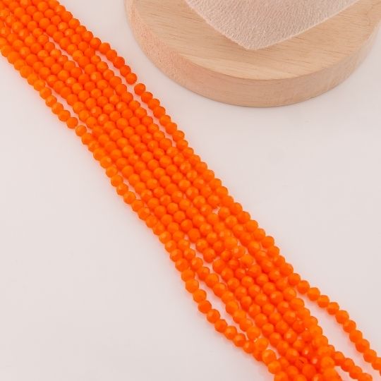 Cristal Rondelle naranja neon 2mm