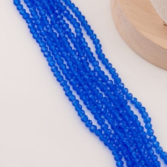Cristal Rondelle azul electrico 4mm