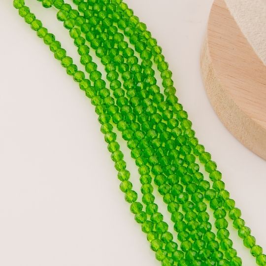 Cristal Rondelle verde bosque traslucido 4mm