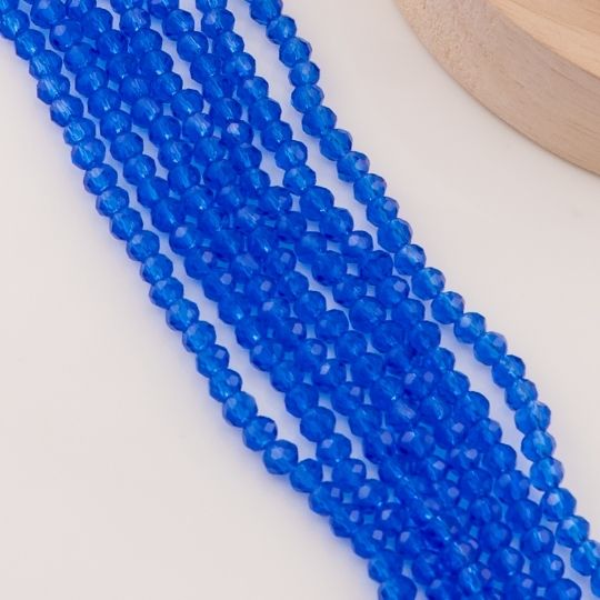 Cristal Rondelle azul electrico 6mm