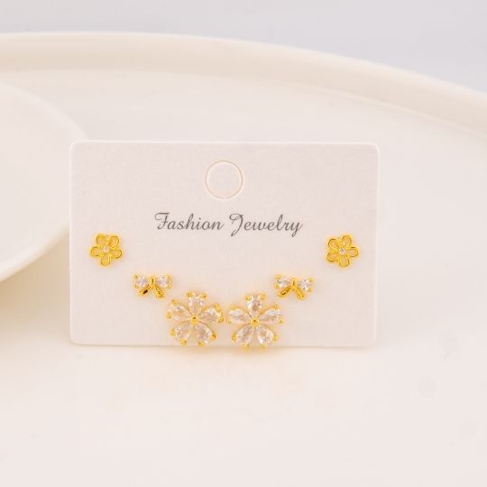 Set 3 pares de aretes flor con zirconias baño 18k