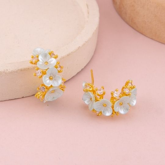 Argollas con flores baño 18k