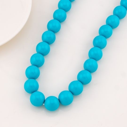 Collar bola chicle azul en concha nacar 14mm baño 18k