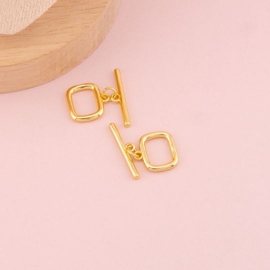 Broche T cuadrado baño 18k 