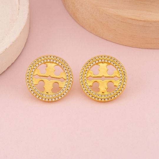 Aretes de marca con zirconias baño 18k