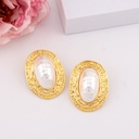 Aretes chunky ovalados con perla shell baño 18k