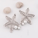 Aretes stuud estrella con perlas baño 18k pin de plata