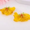 Aretes stud de flores amarillos
