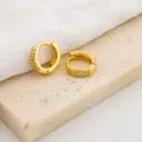 Aretes hugies de 13 MM con zirconias  baño 18k 