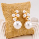 Aretes cogantes con perlas baño 18k
