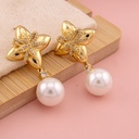 Aretes colgantes con perla baño 18k