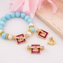 Broche cuadrado fucsia con micropave baño 18k