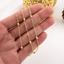 Cadena acero delgada con pelotitas por yarda con baño 18k