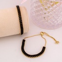 Pulsera ajustable con zirconias baño 18k negra