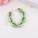 Pulsera ajustable de conchas de mar verde