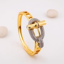 Pulsera brazalete con zirconias dos tonos  baño 18k