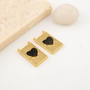  Dije medalla de corazon en micropave color negro baño 18k