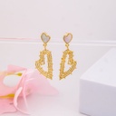 Aretes colgantes de corazones baño 18k
