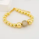 Pulsera con bola de  zirconias  baño 18k