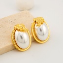 Aretes stud con perla con hoja  baño 18k pin de plata
