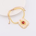Pulsera ajustable con escapulario tejido a mano con  baño 18k