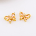 Separador mariposa en micropave cristal rosa baño 18k