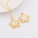 Dije estrella madre perla y baño 18k