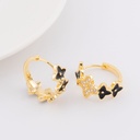Aretes trebol con zirconias y Enamel color negro baño 18k