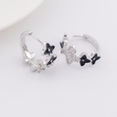 Aretes trebol con zirconias y Enamel color negro baño 18k plateado