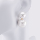 Aretes colgantes con perlas baño 18k