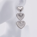 Aretes Chunky colgantes tres corazones baño 18k plateado