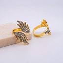 Anillo con forma de alas zirconias baño 18k 