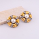 Aretes stud flor con zirconias y perla baño 18k pin de plata
