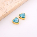  Separador en forma de corazon con concha de nacar y baño 18k