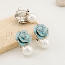 Aretes stud flor con perla patente omega smaltado y baño 18k pin de plata