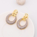 Aretes dos tonos con zirconias baño 18k pin de plata