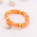 Pulsera elastica en acrilico carey con baño 18k