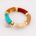 Pulsera elastica en acrilico carey con baño 18k