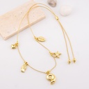 Collar ajustable con dijes marinos estrella, caracol y concha de mar  baño 18k