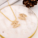 Dije de ¨CHANEL¨ micropave y baño 18k