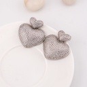 Aretes colgantes corazon con zirconia baño 18k