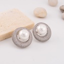 Aretes stud con perlas y zirconia baño 18k