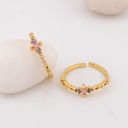 Anillo ajustable  fino con zirconias baño 18k
