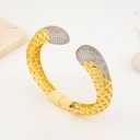 Brazalete con zirconias doble tono  baño 18k