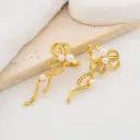Aretes earcuff  chongo con perlas baño 18k
