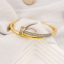 Brazalete clavo dos tonos baño 18k