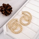 Aretes fiesta con zirconia baño 18k