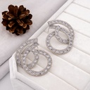 Aretes fiesta con zirconia baño 18k