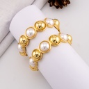 Pulsera tipo aro con perlas baño 18k