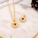 Dije de corazon rojo con concha nacar y  baño 18k